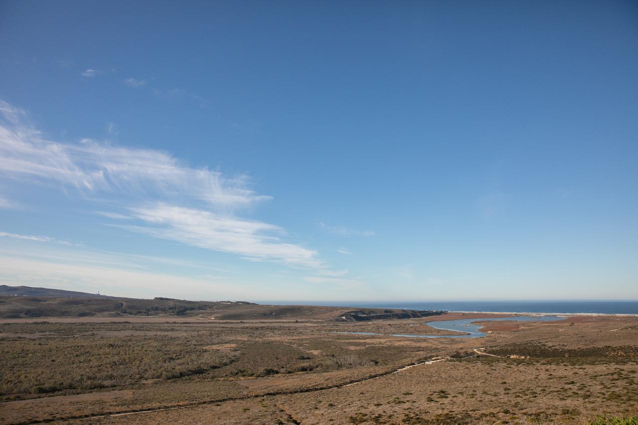 Clear, sunny skies provide a backdrop for California’s Vandenberg Air Force Base, where the SpaceX Falcon 9 rocket carrying the Sentinel-6 Michael Freilich spacecraft awaits liftoff from Space Launch Complex 4, Nov. 21, 2020.  The Sentinel-6/Jason-CS (Continuity of Service) mission consists of the Sentinel-6 Michael Freilich satellite, which will be followed by its twin, the Sentinel-6B satellite, in 2025. The Sentinel-6/Jason-CS mission is part of Copernicus, the European Union’s Earth observation program, managed by the European Commission. Continuing the legacy of the Jason series missions, Sentinel-6/Jason-CS will extend the records of sea level into their fourth decade, collecting accurate measurements of sea surface height for more than 90% of the world’s seas, and providing crucial information for operational oceanography, marine meteorology, and climate studies. Sentinel-6 Michael Freilich launched Nov. 21, 2020, at 9:17 PST (12:17 EST). NASA’s Launch Services Program at Kennedy Space Center was responsible for launch management.