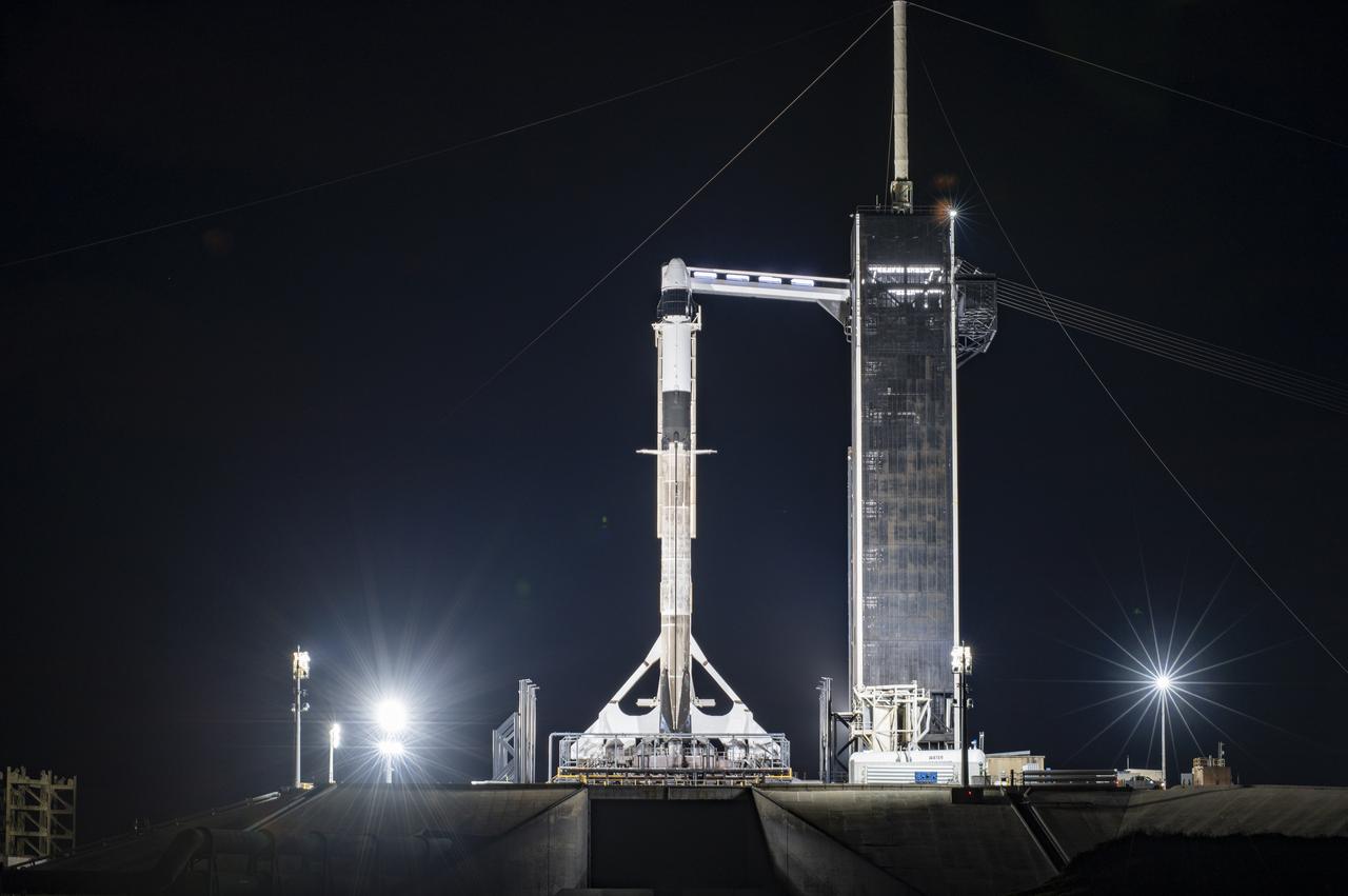 A SpaceX Falcon 9 rocket, topped with the company’s upgraded version of the Dragon spacecraft, stands vertical at NASA Kennedy Space Center’s Launch Complex 39A in Florida on Wednesday, Dec. 2, 2020. The first mission for SpaceX under NASA’s second Commercial Resupply Services contract, CRS-21 is scheduled to lift off from Launch Complex 39A on Saturday, Dec. 5, at 11:39 a.m. EST. The mission will deliver critical supplies and equipment to the International Space Station.