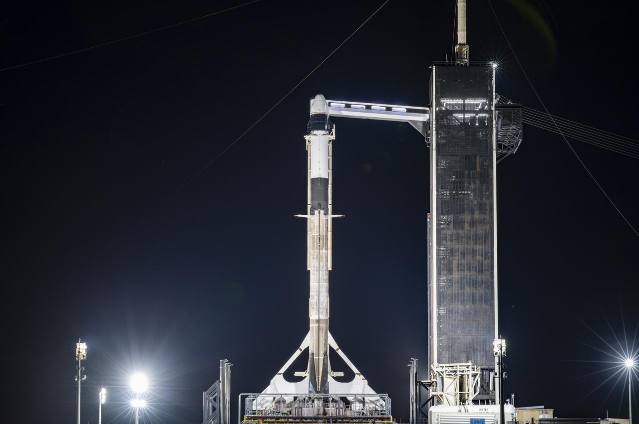 A SpaceX Falcon 9 rocket, topped with the company’s upgraded version of the Dragon spacecraft, stands vertical at NASA Kennedy Space Center’s Launch Complex 39A in Florida on Wednesday, Dec. 2, 2020. The first mission for SpaceX under NASA’s second Commercial Resupply Services contract, CRS-21 is scheduled to lift off from Launch Complex 39A on Saturday, Dec. 5, at 11:39 a.m. EST. The mission will deliver critical supplies and equipment to the International Space Station.