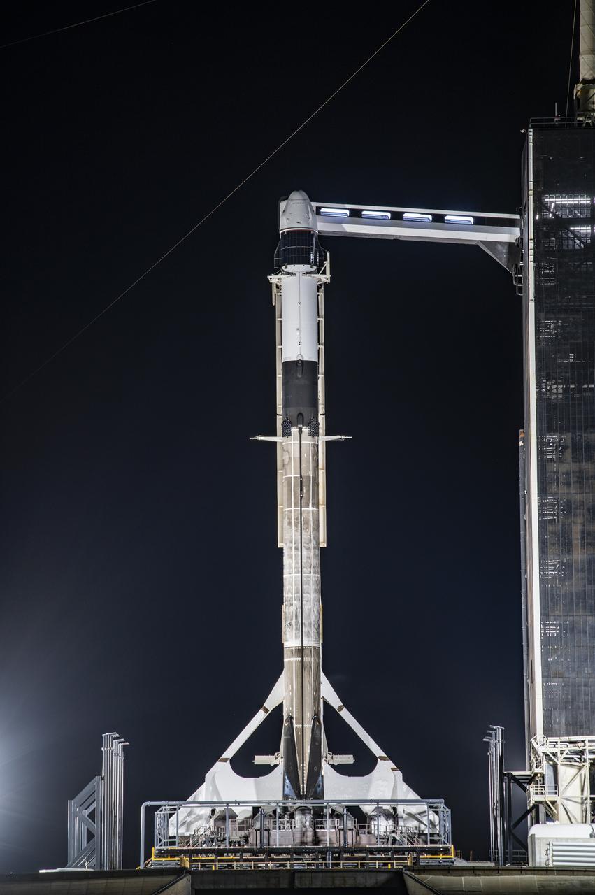 A SpaceX Falcon 9 rocket, topped with the company’s upgraded version of the Dragon spacecraft, stands vertical at NASA Kennedy Space Center’s Launch Complex 39A in Florida on Wednesday, Dec. 2, 2020. The first mission for SpaceX under NASA’s second Commercial Resupply Services contract, CRS-21 is scheduled to lift off from Launch Complex 39A on Saturday, Dec. 5, at 11:39 a.m. EST. The mission will deliver critical supplies and equipment to the International Space Station.