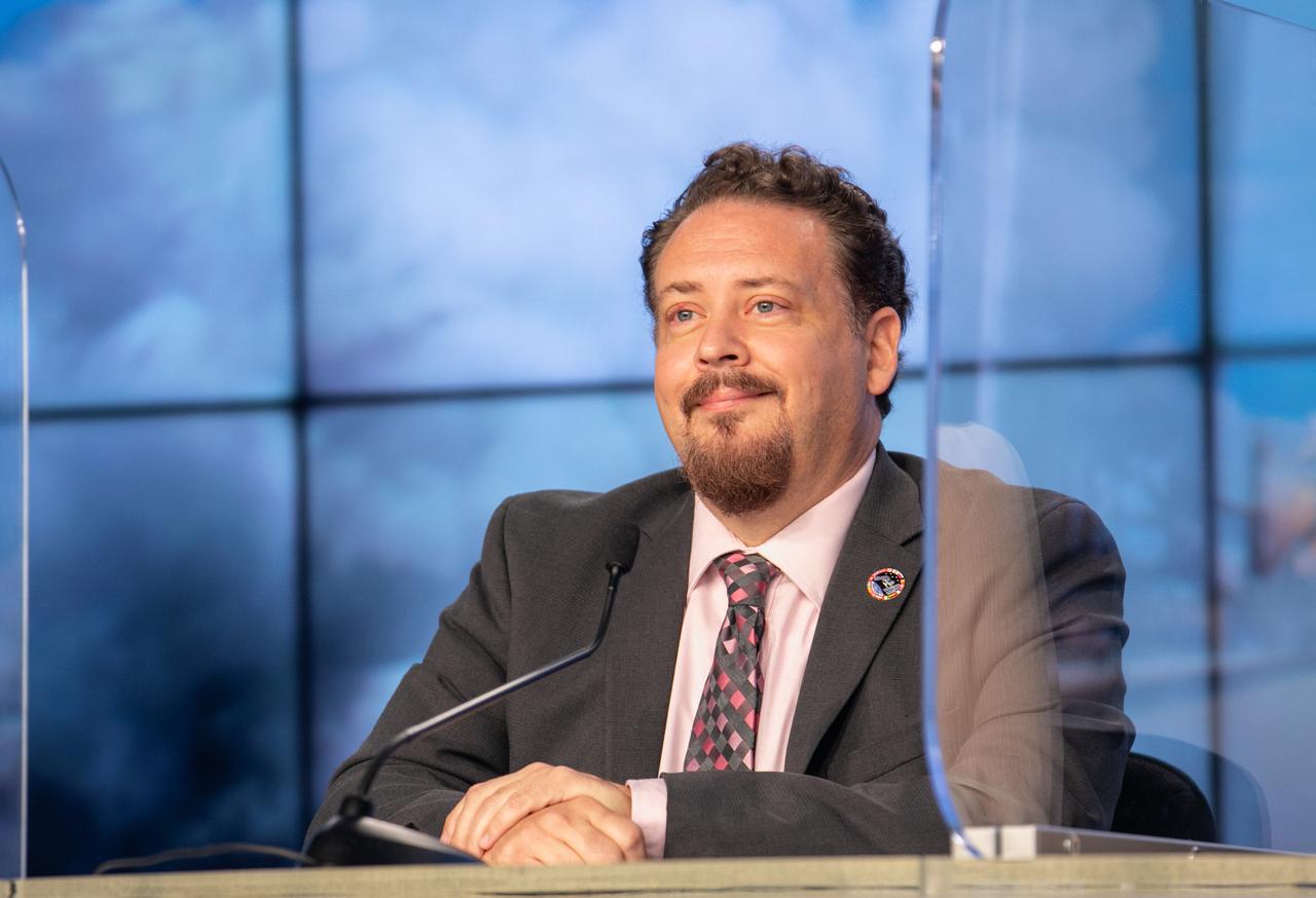 Kirt Costello, chief scientist, International Space Station Program Office, listens to a question during a CRS-21 prelaunch news conference at NASA’s Kennedy Space Center in Florida on Dec. 4, 2020. Kenny Todd, deputy program manager, International Space Station Program Office; Sarah Walker, director, Dragon Mission Management, SpaceX; and Melody Lovin, launch weather officer, U.S. Air Force 45th Space Wing, also participated in the event, which was moderated by NASA Communications’ Jasmine Hopkins. SpaceX’s Falcon 9 rocket, with the upgraded version of the Cargo Dragon spacecraft atop, is targeted to lift off from Kennedy’s Launch Complex 39A Saturday, Dec. 5, at 11:39 a.m. EST. CRS-21 will deliver supplies, equipment, and critical materials needed to support a variety of science and research investigations on the International Space Station.