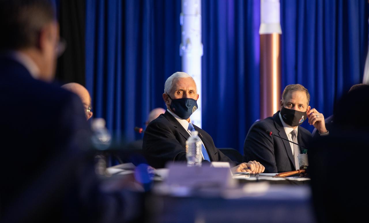Vice President Mike Pence listens during a meeting of the National Space Council inside the Apollo/Saturn V Center at the Kennedy Space Center Visitor Complex in Florida on Dec. 9, 2020. The council's role is to advise the president regarding national space policy and strategy and to review the nation's long-range goals for space activities. At the close of the meeting, Pence announced the initial team of 18 astronauts eligible for early Artemis missions on and around the Moon. Under the Artemis program, NASA will land the first woman and the next man on the Moon in 2024.