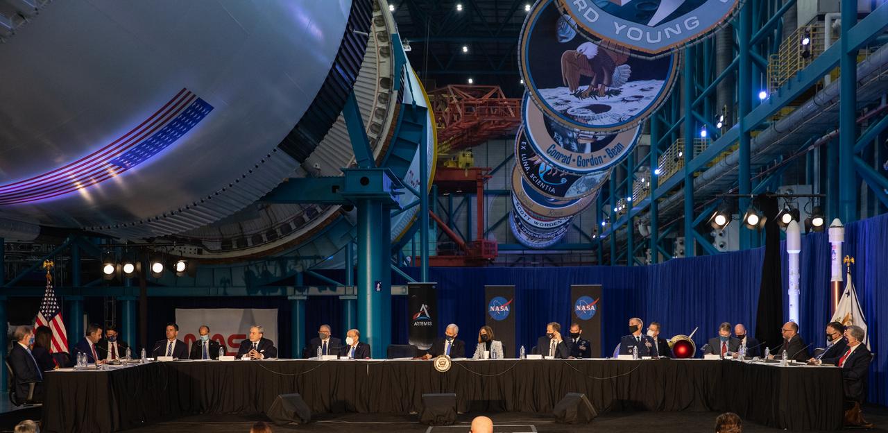 The National Space Council meets inside the Apollo/Saturn V Center at the Kennedy Space Center Visitor Complex in Florida on Dec. 9, 2020. The council's role is to advise the president regarding national space policy and strategy, and to review the nation's long-range goals for space activities. Vice President Mike Pence chaired the meeting, at which he announced the initial team of 18 astronauts eligible for early Artemis missions on and around the Moon. Under the Artemis program, NASA will land the first woman and the next man on the Moon in 2024.