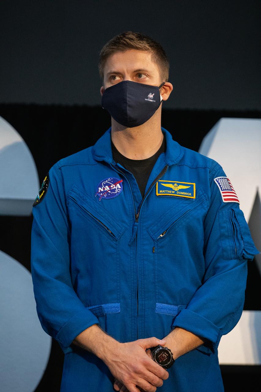 NASA astronaut Matthew Dominick attends an announcement Dec. 9, 2020, that he is one of the initial team of 18 astronauts eligible for early Artemis missions on and around the Moon. A Colorado native, Dominick was selected as a NASA astronaut in 2017. Joining him at the event were fellow astronauts Joseph Acaba, Jessica Meir, Anne McClain, and Jessica Watkins. Vice President Mike Pence made the announcement at the close of a National Space Council meeting he chaired in the Apollo/Saturn V Center at the Kennedy Space Center Visitor Complex in Florida. Under the Artemis program, NASA will land the first woman and the next man on the Moon in 2024.
