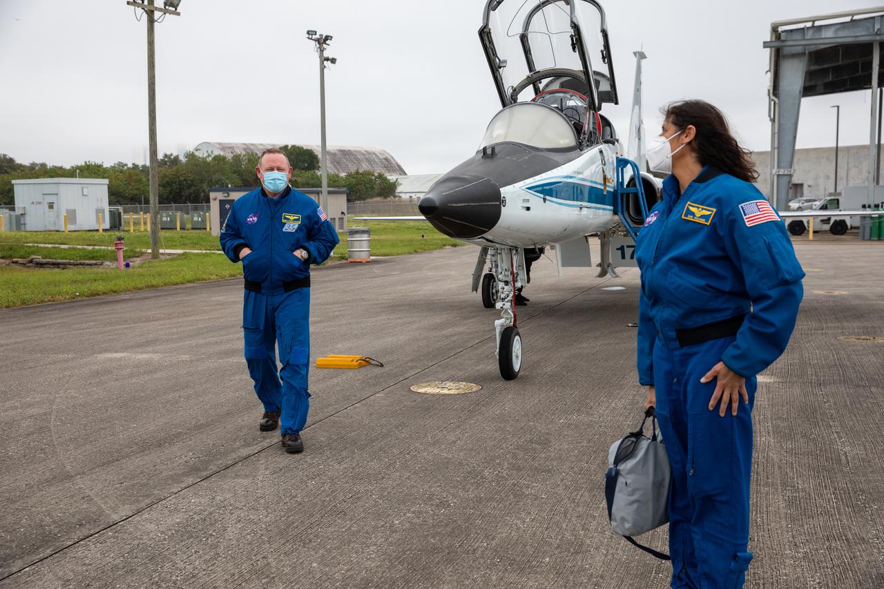 NASA astronauts arrive aboard T-38 jet aircraft at the Launch and Landing Facility at Kennedy Space Center in Florida on Dec. 17, 2020. The astronauts are at Kennedy to prepare for their flights to the International Space Station on Boeing’s CST-100 Starliner, as part of the agency’s Commercial Crew Program. At right is Sunita “Suni” Williams. At left is Barry “Butch” Wilmore. Wilmore and Williams will command the company’s Crew Flight Test and the Starliner-1 mission, respectively.