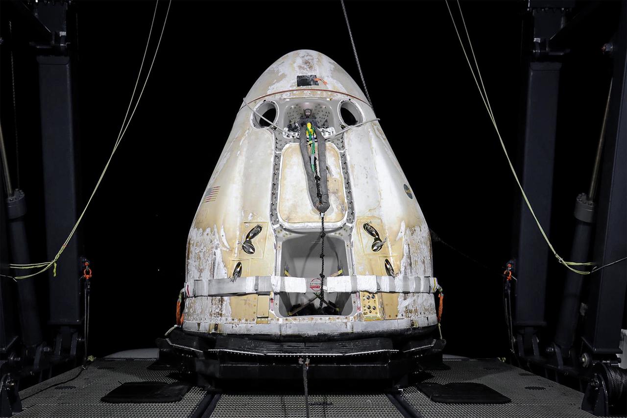Shown here is the SpaceX Cargo Dragon spacecraft on board the company's Go Navigator recovery ship after making its successful parachute-assisted splashdown west of Tampa off the Florida coast on Jan. 13, 2020, at 8:26 p.m. EST. Just after loading Dragon onto Go Navigator, SpaceX packed an Airbus H225 helicopter with the time-sensitive research cargo for delivery to NASA’s Kennedy Space Center. Dragon returned more than 4,400 pounds of scientific experiments and other cargo from the International Space Station. The upgraded cargo Dragon capsule boasts double the powered locker capacity to preserve science samples, allowing for a significant increase in the research that can be carried back to Earth. Photo credit: SpaceX