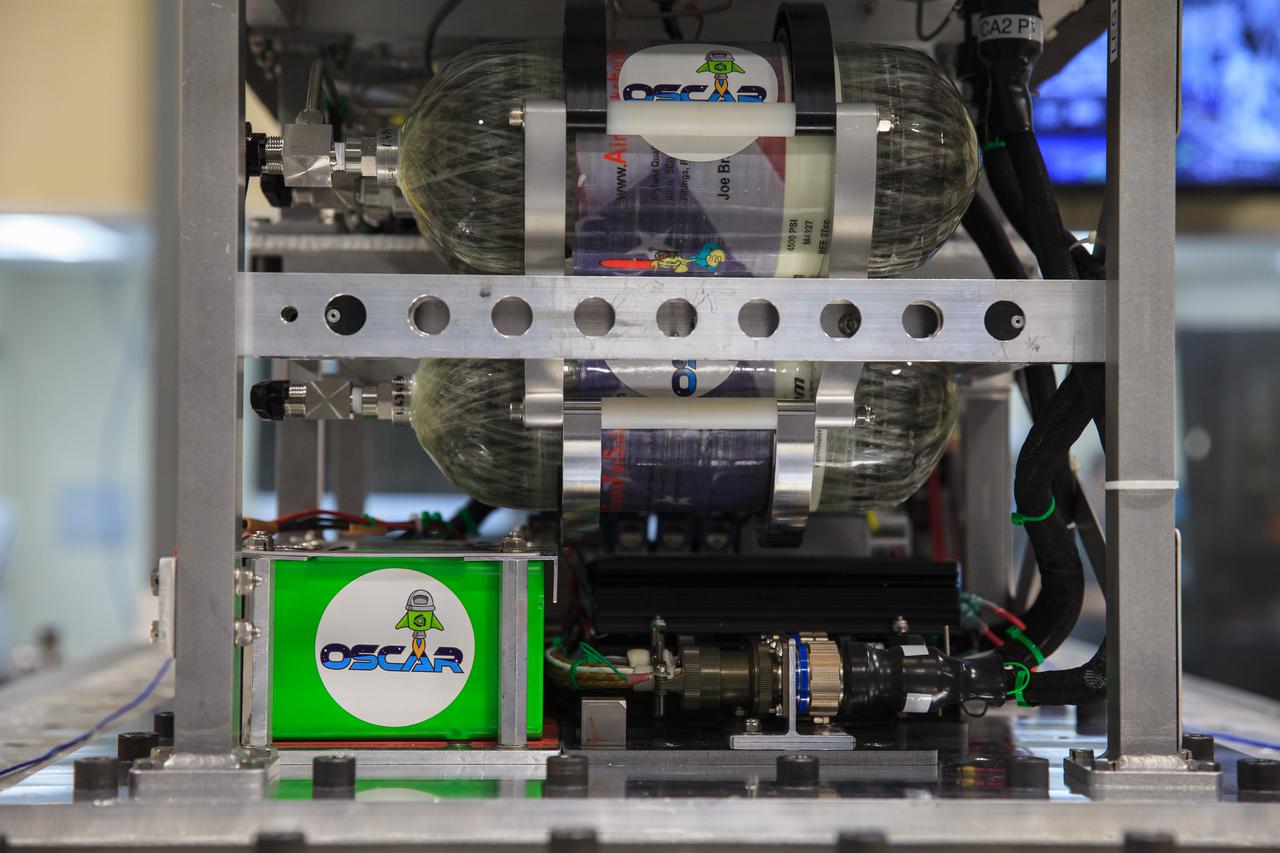 NASA’s Orbital Syngas Commodity Augmentation Reactor, or OSCAR, undergoes vibration testing inside the Vibration Test Lab at the agency’s Kennedy Space Center in Florida on Jan. 14, 2021. The tests are part of ongoing preparation for a scheduled suborbital flight test later this year. Beginning as an Early Career Initiative project, OSCAR studies technology to convert trash and human waste into useful gasses such as methane, hydrogen, and carbon dioxide. By processing small pieces of trash in a high-temperature reactor, OSCAR would reduce the amount of space needed for waste storage within a spacecraft, turn some waste into gasses that have energy storage and life support applications, and ensure waste is no longer biologically active.