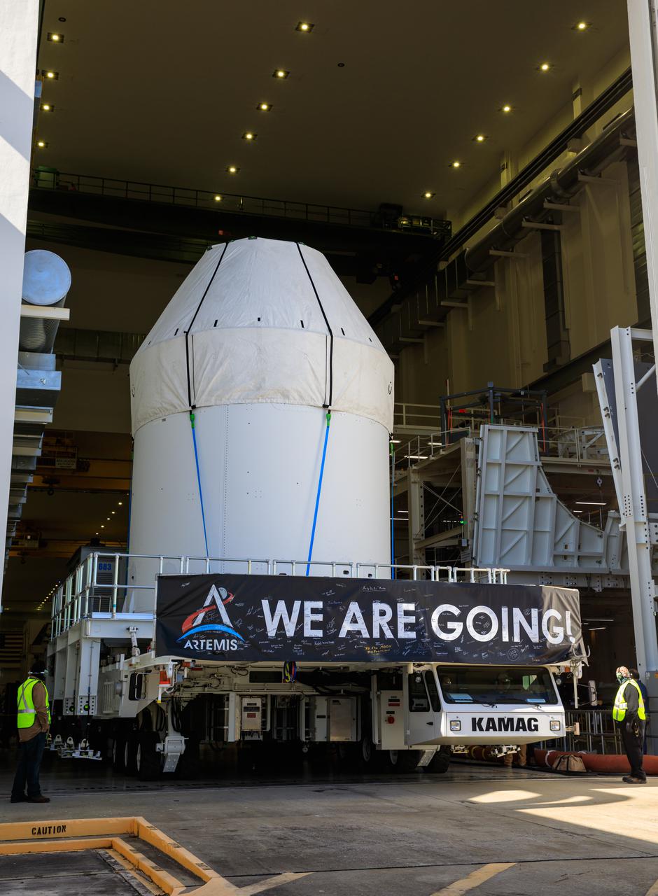 Orion is buttoned up as it sits atop a transport vehicle ready to depart from its home at the Neil Armstrong Operations and Checkout Building at NASA’s Kennedy Space Center in Florida on Jan.16, 2021. Orion will begin its trek to the Multi-Payload Processing Facility. There it will undergo ground processing with the Exploration Ground Systems team taking over ground processing ahead of the Artemis I launch.