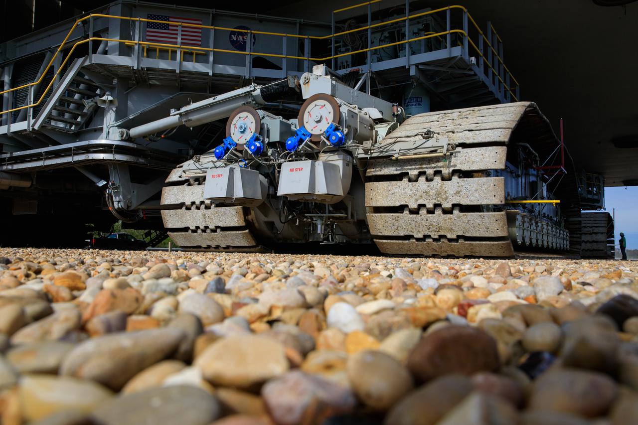 A close-up view of some of the treads on crawler-transporter 2 (CT-2) as the behemoth vehicle moves along the crawlerway at NASA’s Kennedy Space Center in Florida on Jan. 22, 2021. Teams are working to ensure the crawlerway, the path the CT-2, mobile launcher, and Space Launch System rocket with Orion atop will take from the Vehicle Assembly Building to Launch Complex 39B, is strong enough to withstand the weight and provide stability for the Artemis I mission. CT-2 carrying mobile launcher platform 1, used during the shuttle program, was driven back and forth on the crawlerway with several cement blocks, each weighing about 40,000 pounds to strengthen the crawlerway for launch. Artemis I will be the first in a series of increasingly complex missions to the Moon. Under the Artemis program, NASA aims to land the first woman and the next man on the Moon in 2024 and establish sustainable lunar exploration by the end of the decade.