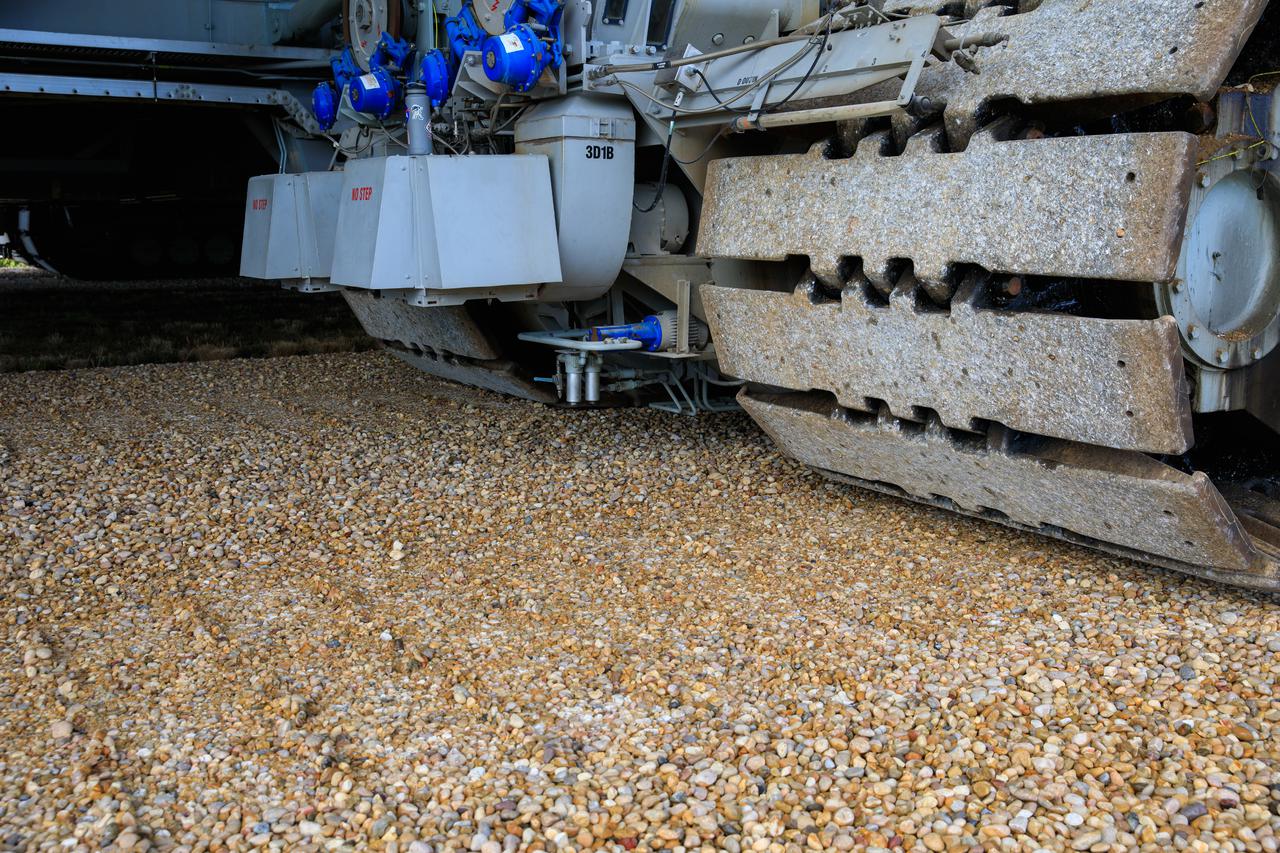 A close-up view of the treads on crawler-transporter 2 (CT-2) as the behemoth vehicle moves along the crawlerway at NASA’s Kennedy Space Center in Florida on Jan. 22, 2021. Teams are working to ensure the crawlerway, the path the CT-2, mobile launcher, and Space Launch System rocket with Orion atop will take from the Vehicle Assembly Building to Launch Complex 39B, is strong enough to withstand the weight and provide stability for the Artemis I mission. CT-2 carrying mobile launcher platform 1, used during the shuttle program, was driven back and forth on the crawlerway with several cement blocks, each weighing about 40,000 pounds to strengthen the crawlerway for launch. Artemis I will be the first in a series of increasingly complex missions to the Moon. Under the Artemis program, NASA aims to land the first woman and the next man on the Moon in 2024 and establish sustainable lunar exploration by the end of the decade.