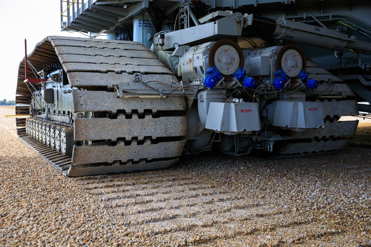 A close-up view of the treads on crawler-transporter 2 (CT-2) as the behemoth vehicle moves along the crawlerway at NASA’s Kennedy Space Center in Florida on Jan. 22, 2021. Teams are working to ensure the crawlerway, the path the CT-2, mobile launcher, and Space Launch System rocket with Orion atop will take from the Vehicle Assembly Building to Launch Complex 39B, is strong enough to withstand the weight and provide stability for the Artemis I mission. CT-2 carrying mobile launcher platform 1, used during the shuttle program, was driven back and forth on the crawlerway with several cement blocks, each weighing about 40,000 pounds to strengthen the crawlerway for launch. Artemis I will be the first in a series of increasingly complex missions to the Moon. Under the Artemis program, NASA aims to land the first woman and the next man on the Moon in 2024 and establish sustainable lunar exploration by the end of the decade.