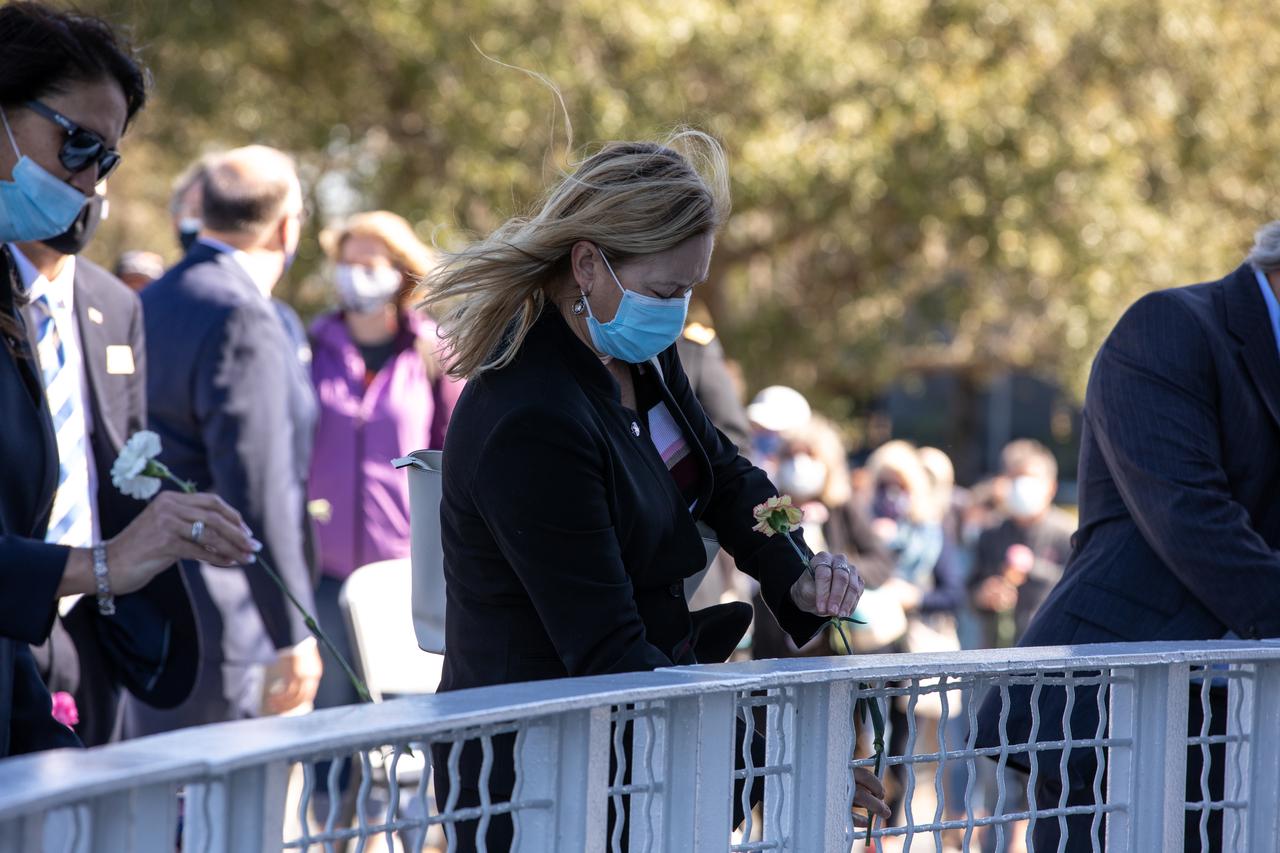 The crews of Apollo 1 and space shuttles Challenger and Columbia, as well as other fallen astronauts who lost their lives in the name of space exploration and discovery, are honored by NASA Kennedy Space Center employees and guests with a ceremony at the Kennedy Visitor Complex’s Space Mirror Memorial on Jan. 28, 2021. The date marked the 35th anniversary of the Challenger tragedy. NASA centers throughout the country participate in the agency’s annual Day of Remembrance memorial event.