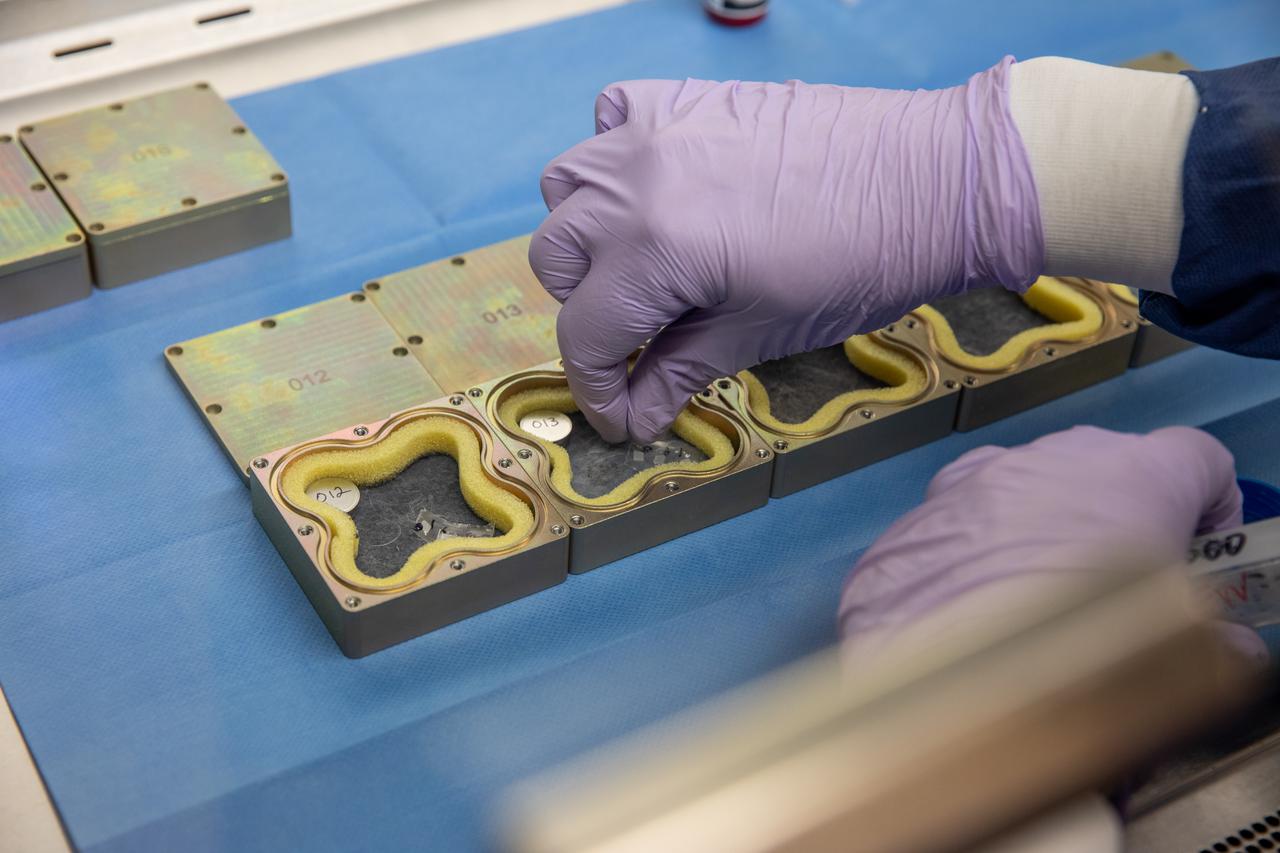 Jeffrey Richards, a project science coordinator working with the Exploration Research and Technology programs at NASA’s Kennedy Space Center in Florida, prepares containers Feb. 11, 2021, for a Materials International Space Station Experiment (MISSE). The containers, carrying sets of seeds, will fly aboard Northrop Grumman’s Cygnus spacecraft as part of NG-15, a NASA commercial resupply mission to the orbiting laboratory targeted for Feb. 20, 2021. They will be placed in the MISSE testing facility, located near the space station’s solar arrays, where they will be exposed to the extreme environment of space for six months before returning to Earth for further study.