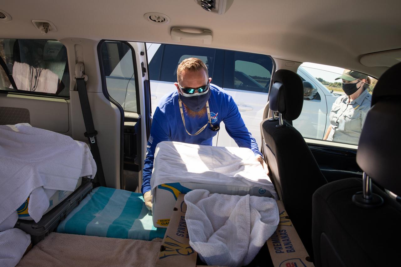Staff with NASA and partner agencies help to unpack the containers of Kemp’s ridley and other sea turtles from the PC12 aircraft that arrived at the Launch and Landing Facility, managed by Space Florida, at NASA’s Kennedy Space Center in Florida on Feb. 26, 2021. The rescued and rehabilitated turtles were flown from aquatic centers in Massachusetts and New York. The containers of turtles will be transferred to vehicles for the short trip to the Canaveral National Seashore, where they will be released into the Atlantic Ocean. NASA, U.S. Fish and Wildlife Service, NOAA Fisheries, Space Florida, and Herndon Solutions Group, the center’s environmental services contractor, provided support. The Turtles Fly Too organization provided the flight to Kennedy. All marine turtle footage/images was obtained with the approval of the Florida Fish and Wildlife Conservation Commission (FWC) under conditions not harmful to marine turtles. Footage was acquired while conducting authorized conservation activities pursuant to: FWC 2021 Consent Permit, MTP-21-005 and MTP-21-114.