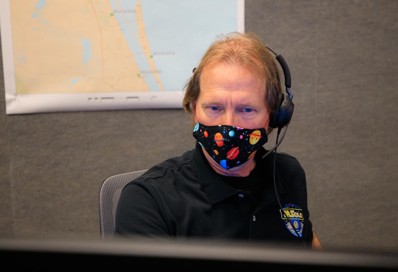 Kevin Smith, software team and science team liaison for NASA’s Mass Spectrometer observing lunar operations (MSolo), takes part in a joint simulation of the Peregrine One Mission on March 26, 2021, at NASA’s Kennedy Space Center in Florida, where MSolo connected from inside the Neil Armstrong Operations and Checkout Building to Astrobotic’s mission control facility in Pittsburgh, Pennsylvania. MSolo is a commercial off-the-shelf mass spectrometer modified to work in space and it will help analyze the chemical makeup of landing sites on the Moon, as well as study water on the lunar surface. This was the first mission round of simulations for Peregrine Mission One to develop and refine procedures between Astrobotic’s Peregrine Lander and MSolo. Later, there will be other simulations with multiple instruments. Peregrine Mission One will be one of NASA’s first Commercial Lunar Payload Delivery Service (CLPS) missions where under the Artemis program, commercial deliveries beginning in 2021 will perform science experiments, test technologies and demonstrate capabilities to help NASA explore the Moon and prepare for human missions.