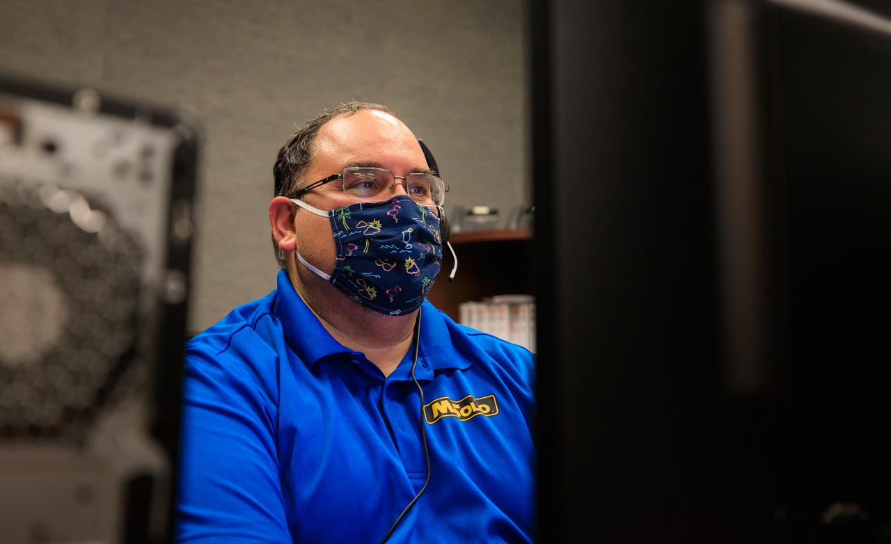 Rolando Nieves, software architect for NASA’s Mass Spectrometer observing lunar operations (MSolo) takes part in a joint simulation of the Peregrine One Mission on March 26, 2021, where MSolo is connected from inside the Neil Armstrong Operations and Checkout Building at NASA’s Kennedy Space Center in Florida to Astrobotic’s mission control facility in Pittsburgh, Pennsylvania. MSolo is a commercial off-the-shelf mass spectrometer modified to work in space and it will help analyze the chemical makeup of landing sites on the Moon, as well as study water on the lunar surface. This was the first mission round of simulations for Peregrine Mission One to develop and refine procedures between Astrobotic’s Peregrine Lander and MSolo. Later, there will be other simulations with multiple instruments. Peregrine Mission One will be one of NASA’s first Commercial Lunar Payload Delivery Service (CLPS) missions where under the Artemis program, commercial deliveries beginning in 2021 will perform science experiments, test technologies and demonstrate capabilities to help NASA explore the Moon and prepare for human missions.