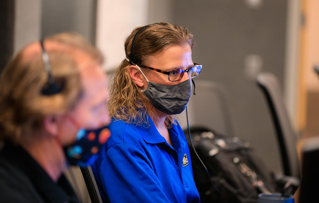 Janine Captain, at right, principal investigator for NASA’s Mass Spectrometer observing lunar operations (MSolo) takes part in a simulation of the Peregrine One Mission on March 26, 2021, where MSolo connected from inside the Neil Armstrong Operations and Checkout Building at NASA’s Kennedy Space Center in Florida to Astrobotic’s mission control facility in Pittsburgh, Pennsylvania. MSolo is a commercial off-the-shelf mass spectrometer modified to work in space and it will help analyze the chemical makeup of landing sites on the Moon, as well as study water on the lunar surface. This was the first mission round of simulations for Peregrine Mission One to develop and refine procedures between Astrobotic’s Peregrine Lander and MSolo. Later, there will be other simulations with multiple instruments. Peregrine Mission One will be one of NASA’s first Commercial Lunar Payload Delivery Service (CLPS) missions where under the Artemis program, commercial deliveries beginning in 2021 will perform science experiments, test technologies and demonstrate capabilities to help NASA explore the Moon and prepare for human missions.