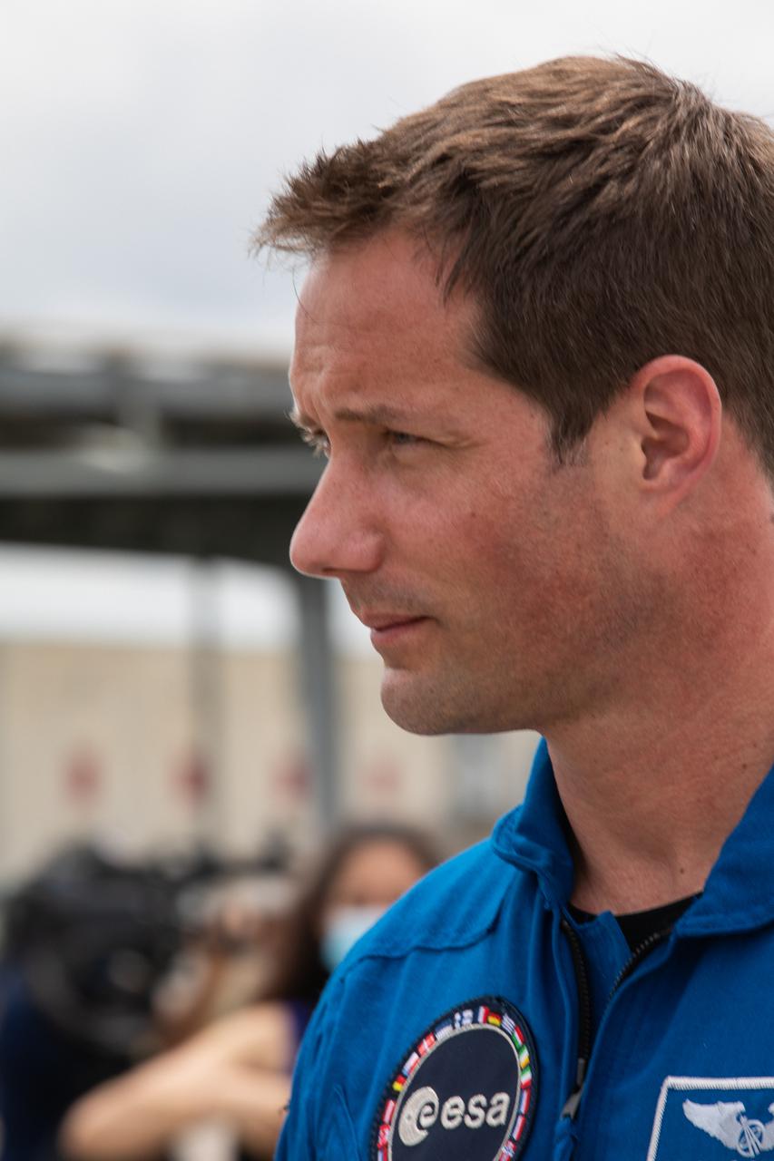 ESA astronaut Thomas Pesquet looks on during the SpaceX Crew-2 arrival media event held at Kennedy Space Center in Florida on April 16, 2021. Pesquet is part of NASA’s SpaceX Crew-2 crew, which includes NASA astronauts Megan McArthur and Shane Kimbrough, along with Akihilo Hoshide of JAXA. The astronauts will fly to the space station on NASA’s SpaceX Crew-2 mission. Liftoff is targeted for Thursday, April 22, at 6:11 a.m. EDT.