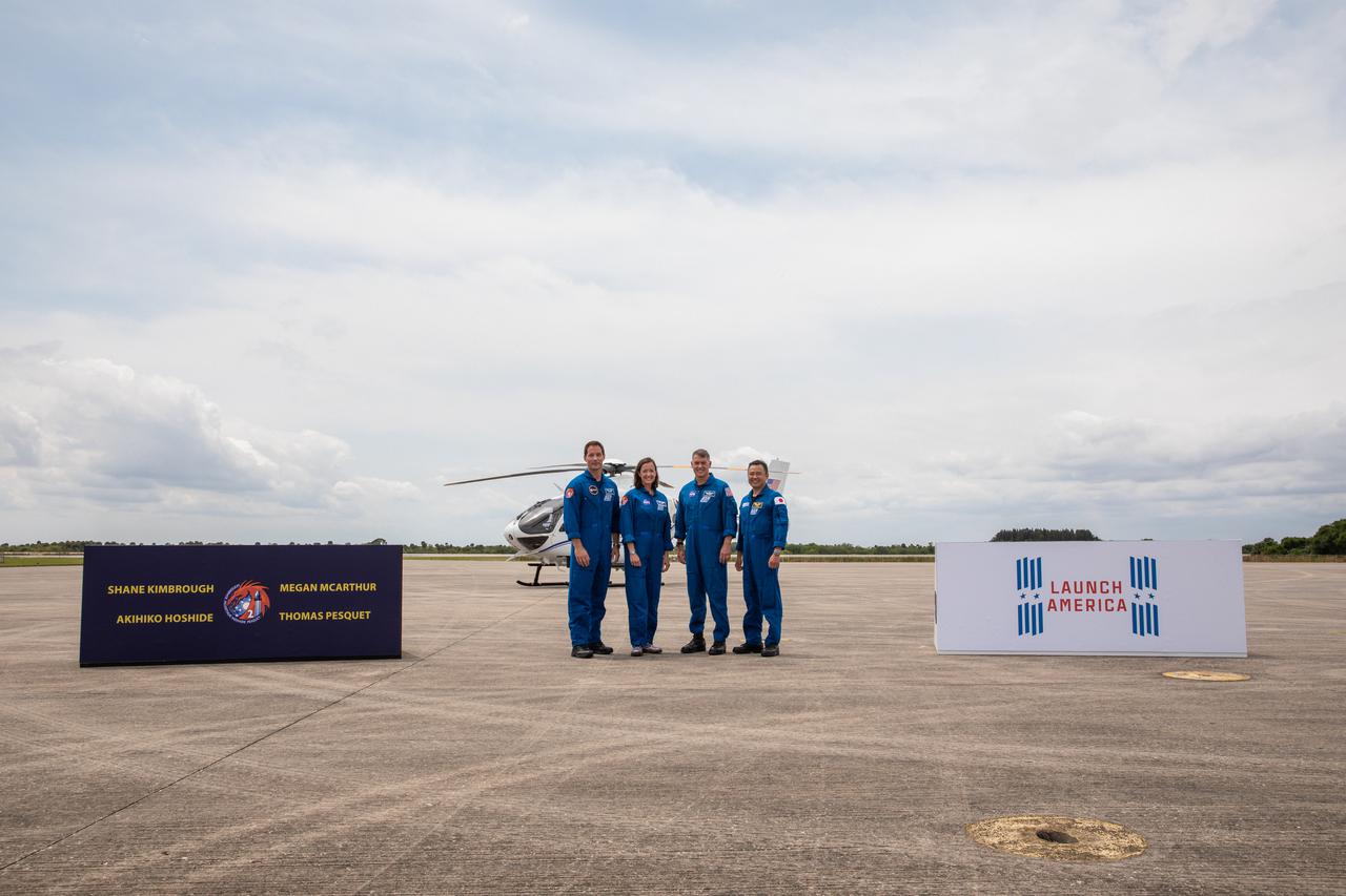From left to right, Crew-2 mission astronauts Thomas Pesquet (ESA), Megan McArthur (NASA), Shane Kimbrough (NASA), and Akihiko Hoshide (JAXA), arrive at Kennedy Space Center’s Launch and Landing Facility on April 16, 2021. The astronauts departed by plane from Ellington Field near the agency’s Johnson Space Center in Houston, making the short flight and touching down at Kennedy. The Crew-2 mission is set to lift off from Kennedy’s Launch Complex 39A on April 22, at 6:11 a.m. EDT.