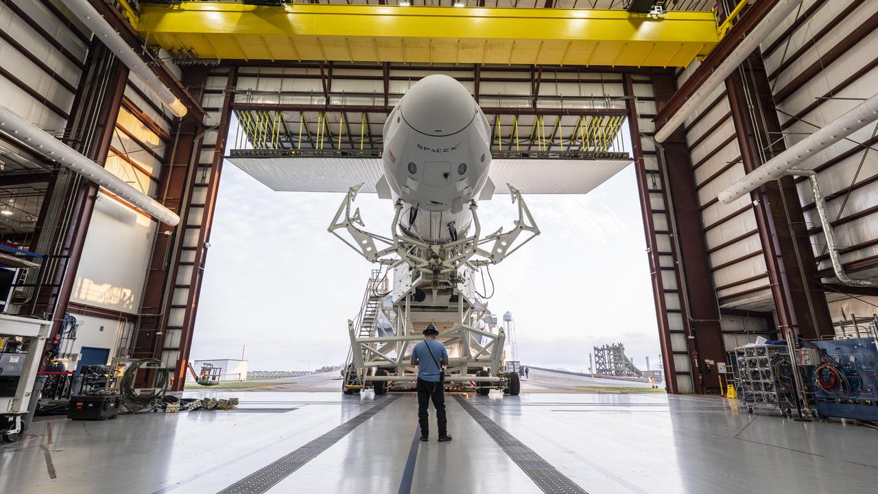 SpaceX’s Crew Dragon “Endeavour,” atop the company’s Falcon 9 rocket, leaves the SpaceX integration hangar adjacent to NASA Kennedy Space Center’s Launch Complex 39A for rollout to the launch pad on April 16, 2021. NASA astronauts Shane Kimbrough and  Megan McArthur, JAXA astronaut Akihiko Hoshide, and ESA astronaut Thomas Pesquet, who arrived at Kennedy on April 16, will fly to the International Space Station on NASA’s SpaceX Crew-2 mission. Liftoff is targeted for Thursday, April 22, at 6:11 a.m. EDT.