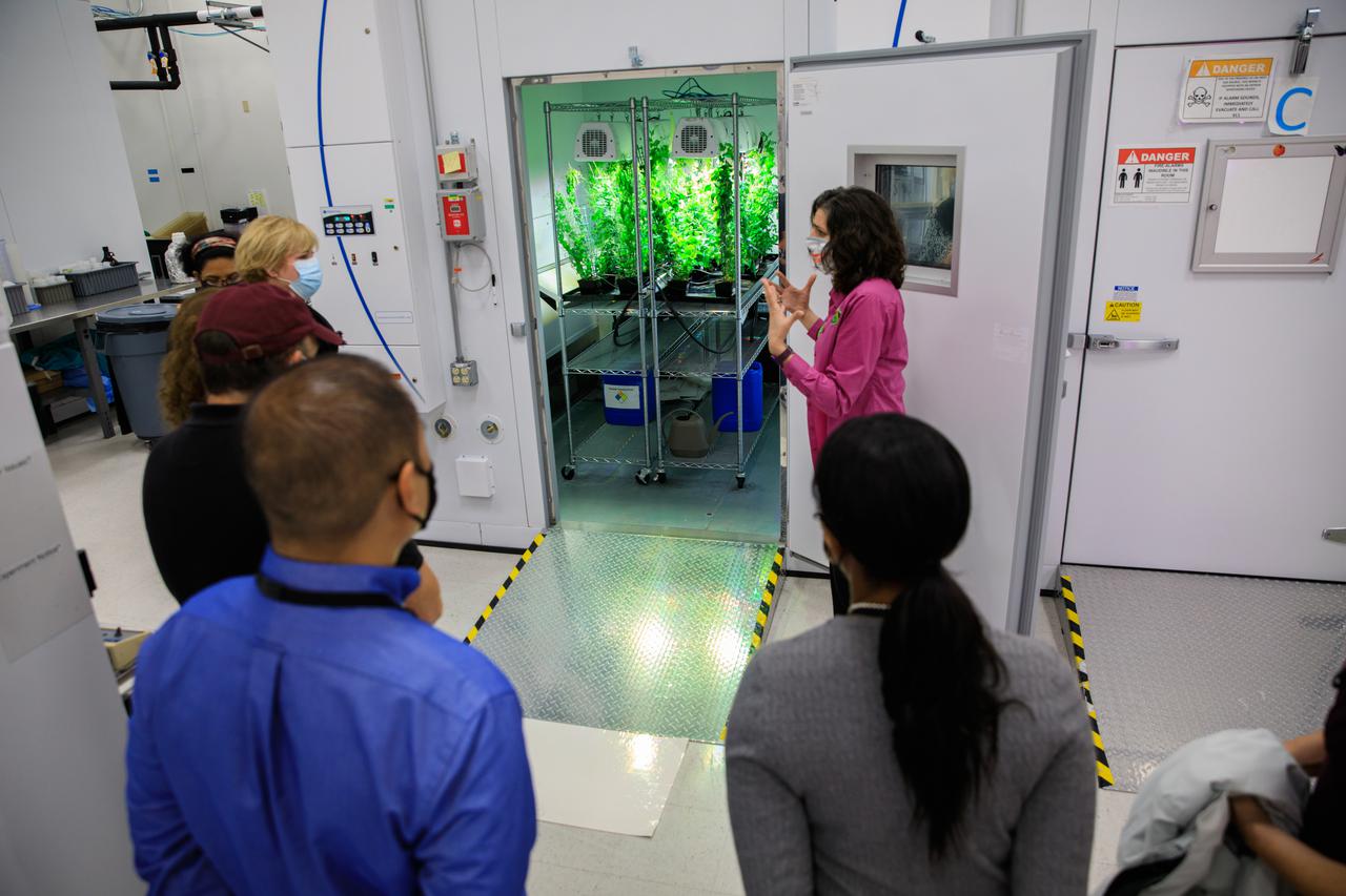 Senior leaders with Kennedy Space Center in Florida, familiarize newly appointed officials from NASA Headquarters with the center’s facilities during a tour on April 19, 2021. The group views plant experiments inside a growth chamber in the Space Station Processing Facility. Plant experiments at Kennedy supports research enabling deep space exploration including experiments in the Veggie and Advanced Plant Habitat systems aboard the International Space Station. 