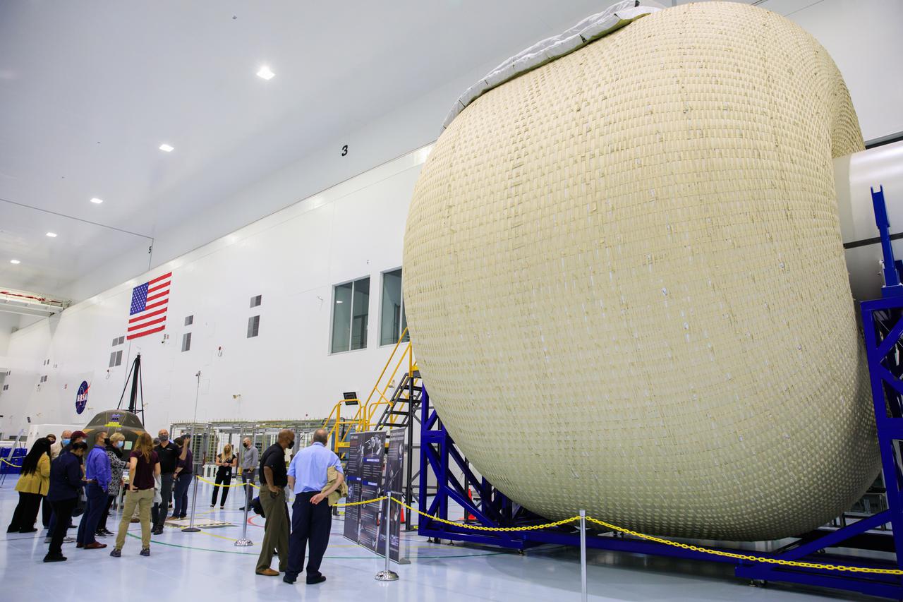 Senior leaders with Kennedy Space Center in Florida, familiarize newly appointed officials from NASA Headquarters with the center’s facilities during a tour on April 19, 2021. The group views Sierra Nevada’s Large Inflatable Fabric Environment (LIFE) habitat inside the Space Station Processing Facility high bay. The habitat is an expandable habitat. Expandable habitats have the benefit of greatly decreasing the amount of volume it takes to launch the habitat, which can then inflate once it is in space. 