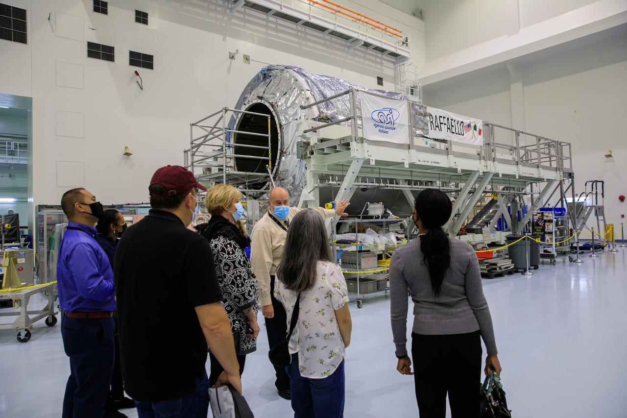 Senior leaders with Kennedy Space Center in Florida, familiarize newly appointed officials from NASA Headquarters with the center’s facilities during a tour on April 19, 2021. The group views the Raffaello Multi-Purpose Logistics Module inside the Space Station Processing Facility high bay. 