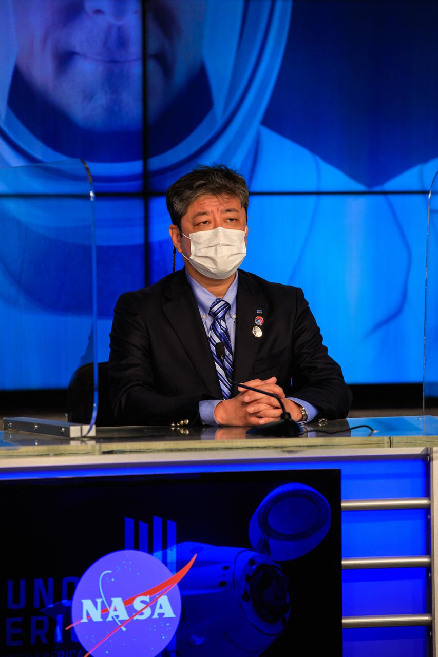 Junichi Sakai, manager, International Space Station Program, JAXA, participates in the SpaceX Crew-2 prelaunch news conference held at NASA’s Kennedy Space Center in Florida on April 20, 2021. NASA astronauts Shane Kimbrough and  Megan McArthur, JAXA astronaut Akihiko Hoshide, and ESA astronaut Thomas Pesquet will fly on Crew-2, the second crew rotation mission to the International Space Station as part of NASA’s Commercial Crew Program. They will launch aboard SpaceX’s Crew Dragon spacecraft, named Endeavour, powered by the company’s Falcon 9 rocket. Liftoff is set for Earth Day, Thursday, April 22, at 6:11 a.m. EDT.