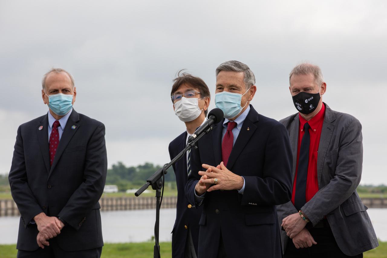 Kennedy Space Center Director Bob Cabana speaks during a NASA Social Facebook Live event April 21, 2021, near the Press Site countdown clock at the Florida Spaceport, ahead of the agency’s SpaceX Crew-2 launch. Also pictured, from left to right, are: Steve Jurczyk, acting NASA administrator; Hiroshi Sasaki, vice president and director general, JAXA’s Human Spaceflight Technology Directorate; and Frank de Winne, manager, International Space Station Program, ESA. NASA astronauts Shane Kimbrough and Megan McArthur, JAXA astronaut Akihiko Hoshide, and ESA astronaut Thomas Pesquet will fly on Crew-2, the second crew rotation mission to the International Space Station as part of NASA’s Commercial Crew Program. They will launch aboard SpaceX’s Crew Dragon spacecraft, named Endeavour, powered by the company’s Falcon 9 rocket. Liftoff is set for Friday, April 23, at 5:49 a.m. EDT.