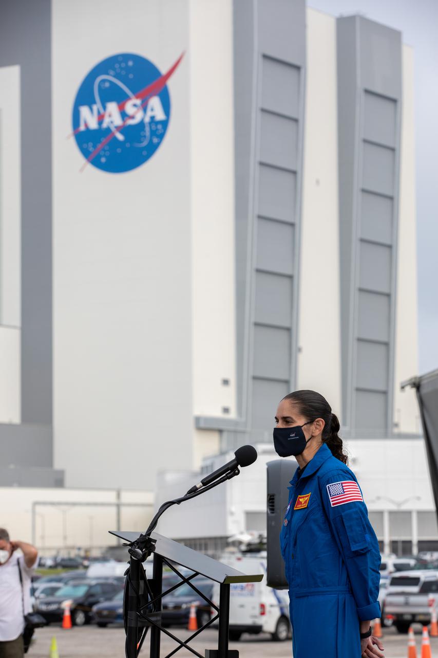 NASA astronaut Jasmin Moghbeli addresses members of the news media during a press briefing April 21, 2021, near the Press Site countdown clock at NASA’s Kennedy Space Center in Florida ahead of the agency’s SpaceX Crew-2 launch. NASA astronauts Shane Kimbrough and  Megan McArthur, JAXA astronaut Akihiko Hoshide, and ESA astronaut Thomas Pesquet will fly on Crew-2, the second crew rotation mission to the International Space Station as part of NASA’s Commercial Crew Program. They will launch aboard SpaceX’s Crew Dragon spacecraft, named Endeavour, powered by the company’s Falcon 9 rocket. Liftoff is set for Friday, April 23, at 5:49 a.m. EDT.