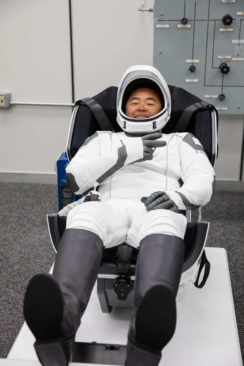 JAXA astronaut Akihiko Hoshide is seated inside the crew suit-up room in the Neil Armstrong Operations and Checkout Building at NASA’s Kennedy Space Center in Florida, on April 23, 2021. Hoshide, along with NASA astronauts Megan McArthur and Shane Kimbrough, and ESA astronaut Thomas Pesquet, will head to the International Space Station on NASA’s SpaceX Crew-2 mission. SpaceX’s Crew Dragon Endeavour will launch on the company’s Falcon 9 rocket from Kennedy’s Launch Complex 39A today at 5:49 a.m. EDT.
