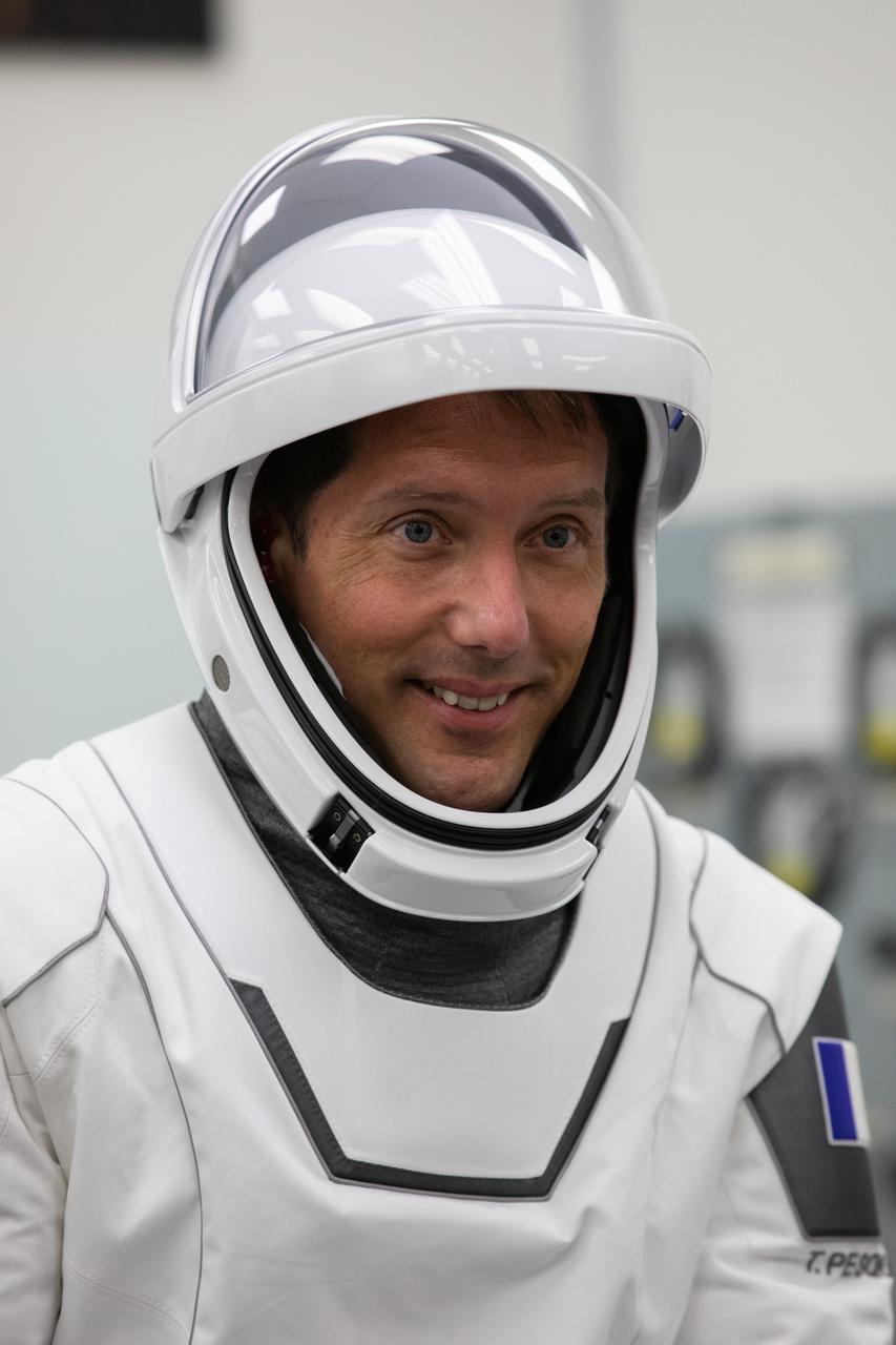 ESA astronaut Thomas Pesquet smiles inside the crew suit-up room in the Neil Armstrong Operations and Checkout Building at NASA’s Kennedy Space Center in Florida, on April 23, 2021. Pesquet, along with NASA astronauts Megan McArthur and Shane Kimbrough, and JAXA astronaut Akihiko Hoshide, will head to the International Space Station on NASA’s SpaceX Crew-2 mission. SpaceX’s Crew Dragon Endeavour will launch on the company’s Falcon 9 rocket from Kennedy’s Launch Complex 39A today at 5:49 a.m. EDT.