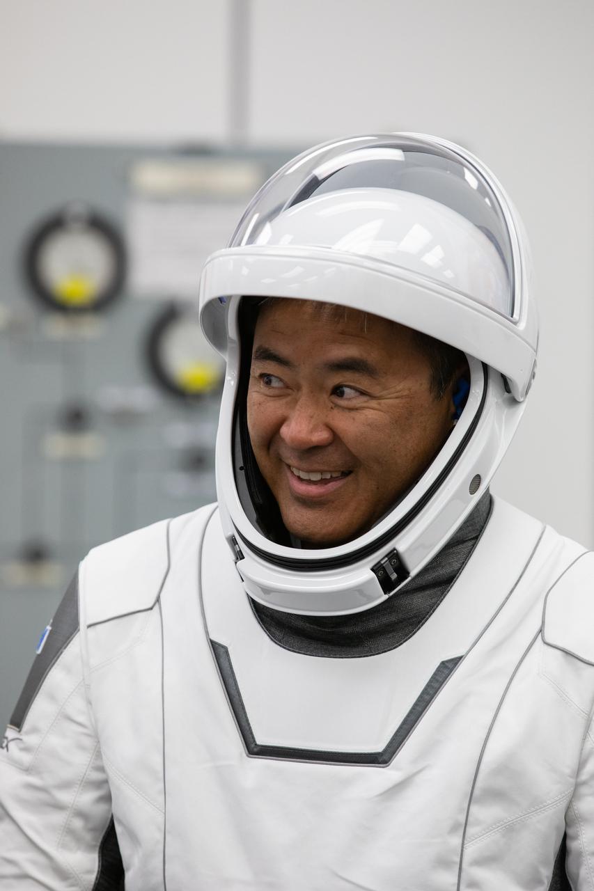 JAXA astronaut Akihiko Hoshide smiles inside the crew suit-up room in the Neil Armstrong Operations and Checkout Building at NASA’s Kennedy Space Center in Florida, on April 23, 2021. Hoshide, along with NASA astronauts Shane Kimbrough and Megan McArthur, and ESA astronaut Thomas Pesquet, will head to the International Space Station on NASA’s SpaceX Crew-2 mission. SpaceX’s Crew Dragon Endeavour will launch on the company’s Falcon 9 rocket from Kennedy’s Launch Complex 39A today at 5:49 a.m. EDT.