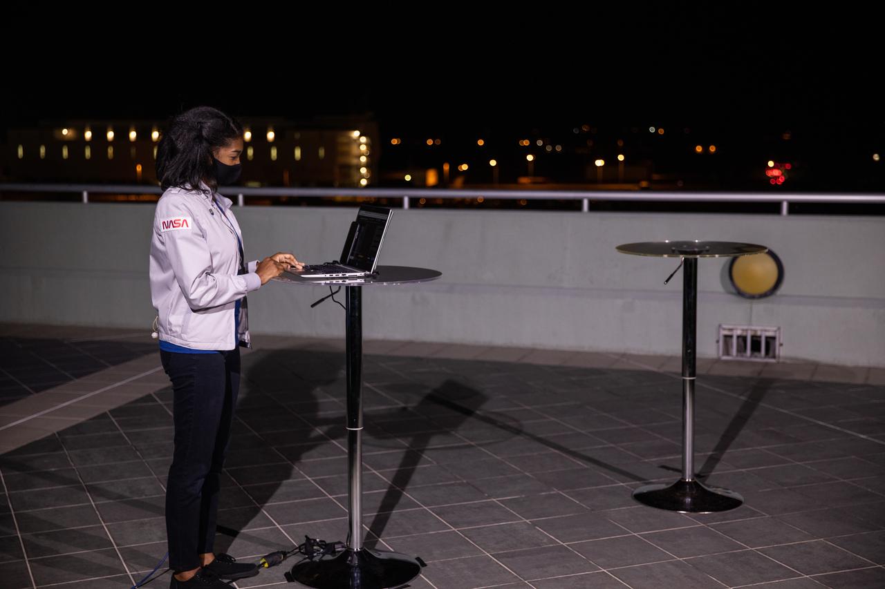 NASA Communications’ Jasmine Hopkins interviews individuals from NASA and the European Space Agency (ESA) on the Operations and Support Building II balcony at NASA’s Kennedy Space Center in Florida during the agency’s SpaceX Crew-2 launch broadcast on April 23, 2021. The SpaceX Falcon 9 rocket and Crew Dragon spacecraft lifted off from Kennedy’s Launch Complex 39A at 5:49 a.m. EDT. Part of NASA’s Commercial Crew Program, Crew-2 delivered NASA astronauts Shane Kimbrough and Megan McArthur, Japan Aerospace Exploration Agency (JAXA) astronaut Akihiko Hoshide, and ESA astronaut Thomas Pesquet to the International Space Station for a six-month science mission.