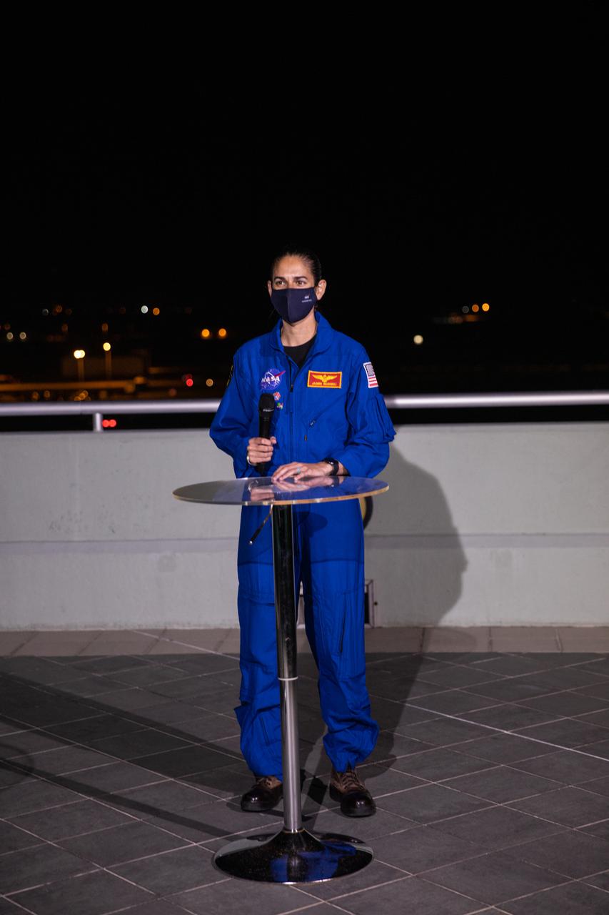 NASA astronaut Jasmin Moghbeli participates in an interview on the Operations and Support Building II balcony during the launch broadcast for NASA’s SpaceX Crew-2 mission at the agency’s Kennedy Space Center in Florida on April 23, 2021. The SpaceX Falcon 9 rocket and Crew Dragon spacecraft lifted off from Kennedy’s Launch Complex 39A at 5:49 a.m. EDT. Part of NASA’s Commercial Crew Program, Crew-2 delivered NASA astronauts Shane Kimbrough and Megan McArthur, Japan Aerospace Exploration Agency (JAXA) astronaut Akihiko Hoshide, and European Space Agency (ESA) astronaut Thomas Pesquet to the International Space Station for a six-month science mission.