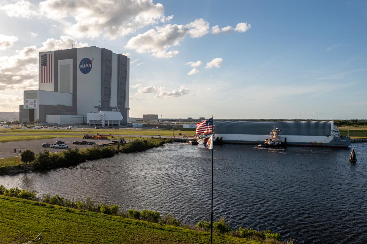 After its journey from NASA’s Stennis Space Center in Mississippi aboard the Pegasus barge, the mighty Space Launch System (SLS) core stage arrives at the agency’s Kennedy Space Center in Florida on April 27, 2021. The core stage is the final piece of Artemis hardware to arrive at the spaceport and will be offloaded and moved to Kennedy’s Vehicle Assembly Building, where it will be prepared for integration atop the mobile launcher with the completed stack of solid rocket boosters ahead of the Artemis I launch. The first in a series of increasingly complex missions, Artemis I will test SLS and Orion as an integrated system prior to crewed flights to the Moon.