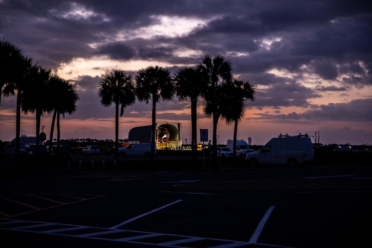 After its journey from NASA’s Stennis Space Center aboard the Pegasus barge, the core stage of the Space Launch System (SLS) rocket arrived at the agency’s Kennedy Space Center April 27. Shown against a Florida sunrise, it is the final piece of Artemis hardware to arrive at the spaceport. Engineers with Exploration Ground Systems and lead contractor Jacobs will offload the core stage and move it to the center’s Vehicle Assembly Building for integration atop the mobile launcher with the completed stack of solid rocket boosters ahead of the Artemis I launch. The SLS will be the most powerful rocket in the world, producing up to 8.8 million pounds of thrust during its Artemis I launch. Artemis I will be an uncrewed test of the Orion spacecraft and SLS rocket as an integrated system ahead of crewed flights to the Moon. Under the Artemis program, NASA aims to land the first woman and the first person of color on the Moon to establish sustainable lunar presence and prepare for human missions to Mars.