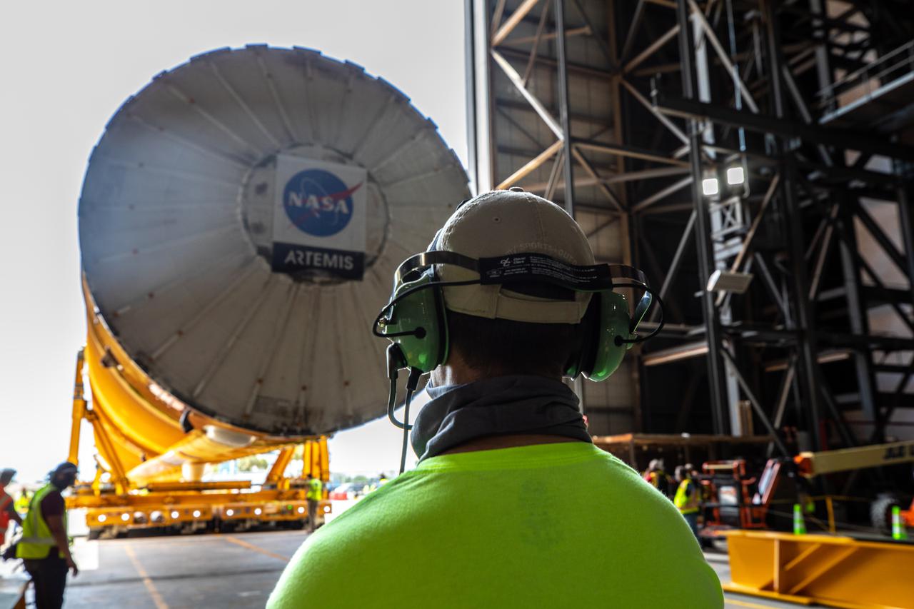 After completing its journey from NASA’s Stennis Space Center in Mississippi aboard the Pegasus barge, teams with Exploration Ground Systems (EGS) and lead contractor Jacobs transport the massive Space Launch System (SLS) core stage to Kennedy Space Center’s Vehicle Assembly Building in Florida on April 29, 2021. Once inside the VAB, it will be prepared for integration with the completed stack of solid rocket boosters atop the mobile launcher ahead of the Artemis I launch. The first in a series of increasingly complex missions, Artemis I will test SLS and Orion as an integrated system prior to crewed flights to the Moon.