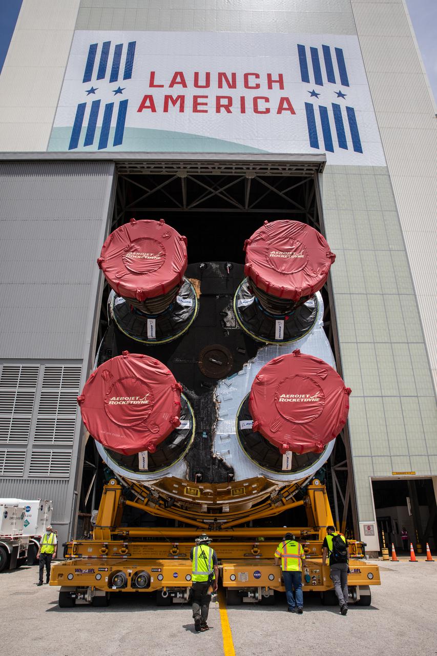 After completing its journey from NASA’s Stennis Space Center in Mississippi aboard the Pegasus barge, teams with Exploration Ground Systems (EGS) and lead contractor Jacobs transport the massive Space Launch System (SLS) core stage to Kennedy Space Center’s Vehicle Assembly Building in Florida on April 29, 2021. Once inside the VAB, it will be prepared for integration with the completed stack of solid rocket boosters atop the mobile launcher ahead of the Artemis I launch. The first in a series of increasingly complex missions, Artemis I will test SLS and Orion as an integrated system prior to crewed flights to the Moon.