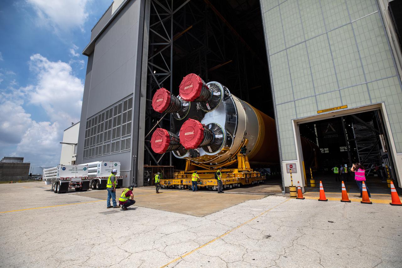 After completing its journey from NASA’s Stennis Space Center in Mississippi aboard the Pegasus barge, teams with Exploration Ground Systems (EGS) and lead contractor Jacobs transport the massive Space Launch System (SLS) core stage to Kennedy Space Center’s Vehicle Assembly Building in Florida on April 29, 2021. Once inside the VAB, it will be prepared for integration with the completed stack of solid rocket boosters atop the mobile launcher ahead of the Artemis I launch. The first in a series of increasingly complex missions, Artemis I will test SLS and Orion as an integrated system prior to crewed flights to the Moon.