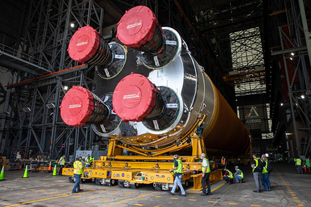 After completing its journey from NASA’s Stennis Space Center in Mississippi aboard the Pegasus barge, teams with Exploration Ground Systems (EGS) and lead contractor Jacobs transport the massive Space Launch System (SLS) core stage to Kennedy Space Center’s Vehicle Assembly Building in Florida on April 29, 2021. Once inside the VAB, it will be prepared for integration with the completed stack of solid rocket boosters atop the mobile launcher ahead of the Artemis I launch. The first in a series of increasingly complex missions, Artemis I will test SLS and Orion as an integrated system prior to crewed flights to the Moon.