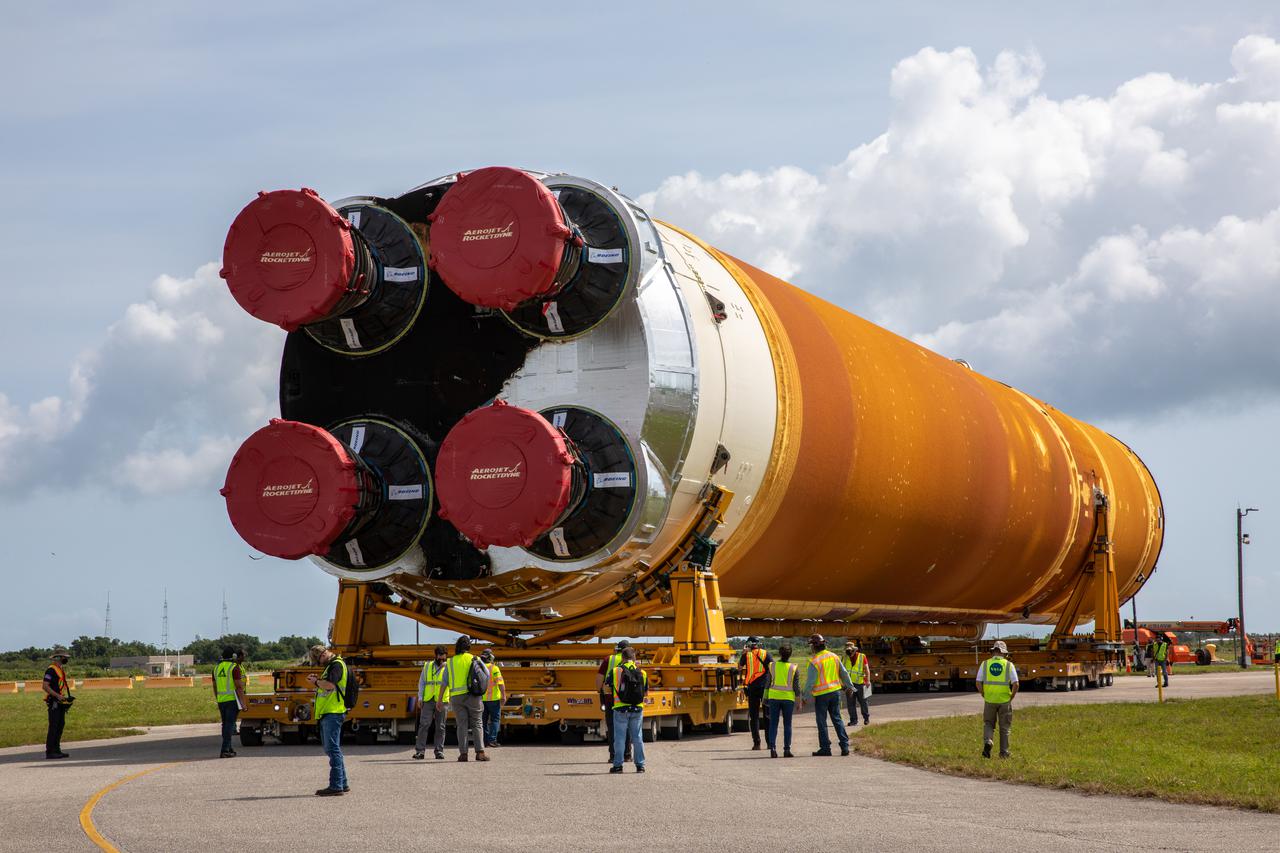 After completing its journey from NASA’s Stennis Space Center in Mississippi aboard the Pegasus barge, teams with Exploration Ground Systems (EGS) and lead contractor Jacobs transport the massive Space Launch System (SLS) core stage to Kennedy Space Center’s Vehicle Assembly Building in Florida on April 29, 2021. Once inside the VAB, it will be prepared for integration with the completed stack of solid rocket boosters atop the mobile launcher ahead of the Artemis I launch. The first in a series of increasingly complex missions, Artemis I will test SLS and Orion as an integrated system prior to crewed flights to the Moon.