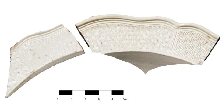 Artifacts retrieved from the ruins of Elliot Plantation on NASA’s Kennedy Space Center in Florida show high-status fine dining wares imported from 18th century England. The white salt-glazed stoneware and creamware dining wares were found scattered near a large structure, determined by archeologists to be the dwelling of the plantation overseer. The dining wares have known dates of time for manufacturing and use during the 1760s through the 1770s and helped archeologists confirm the site was from the same period. The ruins of Elliot Plantation date from the 1760s and represent the largest, earliest, and southernmost British period sugar plantation in the U.S., as well as one of the most intact and best examples of a completely preserved enslaved landscape. In interagency cooperation between the National Park Service, the U.S. Fish and Wildlife Service, and NASA, and with the assistance of volunteers from the Indian River Anthropological Society, and historic preservation offices of Brevard and Volusia counties, approximately 200 shovel tests and 20 excavation units were completed in three areas of the plantation complex from 2008 to 2009.