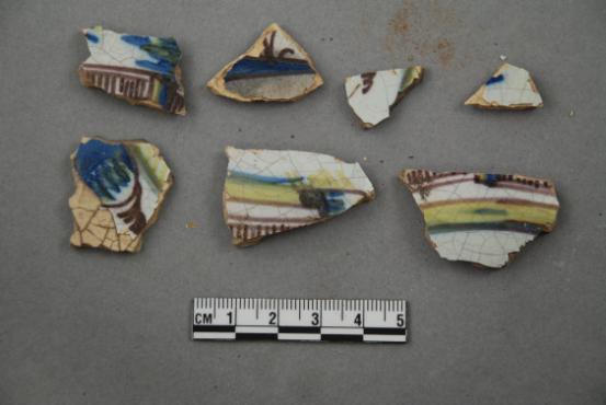 Artifacts retrieved from the ruins of Elliot Plantation on NASA’s Kennedy Space Center in Florida include Spanish majolica fragments, likely produced between the 1730s to the 1750s and imported to the plantation from England. Ceramic fragments of majolica, delftware, and other high-status domestic wares were retrieved from ruins determined to be the dwelling of the plantation overseer. The ruins of Elliot Plantation date from the 1760s and represent the largest, earliest, and southernmost British period sugar plantation in the U.S., as well as one of the most intact and best examples of a completely preserved enslaved landscape. In interagency cooperation between the National Park Service, the U.S. Fish and Wildlife Service, and NASA, and with the assistance of volunteers from the Indian River Anthropological Society, and historic preservation offices of Brevard and Volusia counties, approximately 200 shovel tests and 20 excavation units were completed in three areas of the plantation complex from 2008 to 2009.