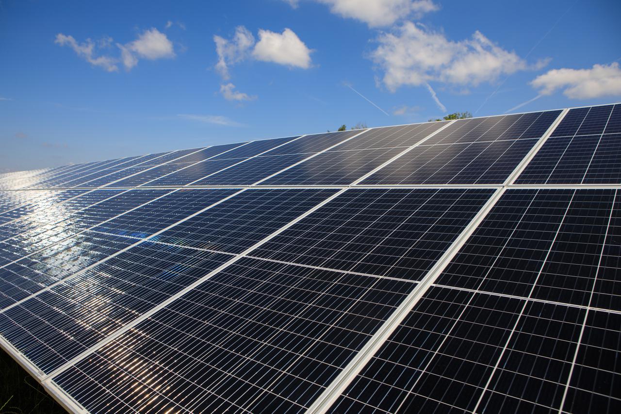 Seen here is an up-close view of solar panels that are part of Florida Power and Light’s (FPL) new Discovery Solar Energy Center – a 74.5-megawatt solar site, spanning 491 acres at NASA’s Kennedy Space Center in Florida. The site contains about 250,000 solar panels in total, producing enough energy to power approximately 15,000 homes. Harnessing energy from the Sun, the panels do not directly power anything at Kennedy, but rather, send energy directly to FPL's electricity grid for distribution to existing customers. Construction began in spring 2020, and the energy center became fully operational on May 30, 2021.