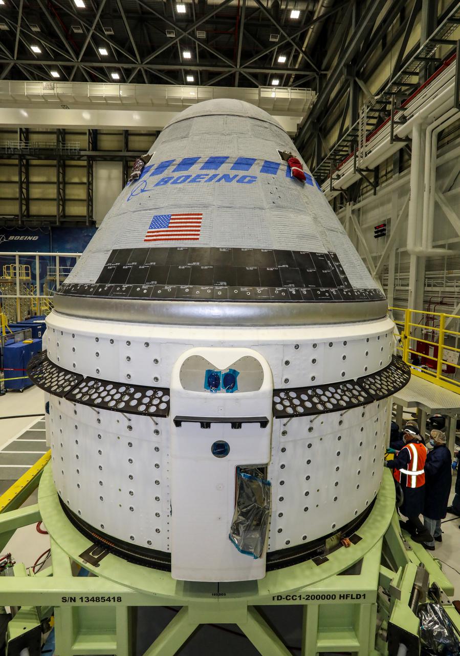The Boeing CST-100 Starliner spacecraft to be flown on Orbital Flight Test-2 (OFT-2) is seen in the Commercial Crew and Cargo Processing Facility at NASA’s Kennedy Space Center in Florida on June 2. Part of the agency’s Commercial Crew Program, OFT-2 is a critical developmental milestone on the company’s path to fly crew missions for NASA.