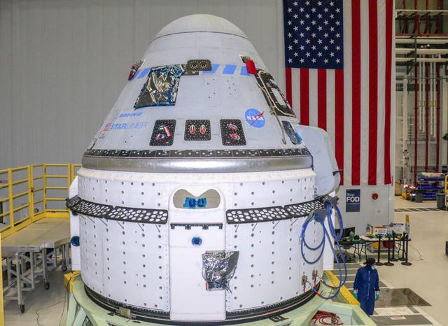 The Boeing CST-100 Starliner spacecraft to be flown on Orbital Flight Test-2 (OFT-2) is seen in the Commercial Crew and Cargo Processing Facility at NASA’s Kennedy Space Center in Florida on June 2. Part of the agency’s Commercial Crew Program, OFT-2 is a critical developmental milestone on the company’s path to fly crew missions for NASA.