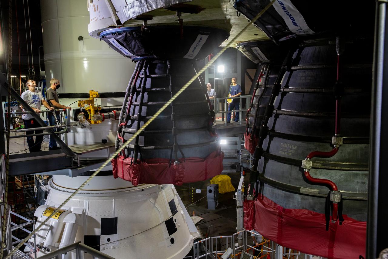Seen here is a close-up view of the Space Launch System’s (SLS) RS-25 engines as teams with NASA’s Exploration Ground Systems and contractor Jacobs lower the core stage – the largest part of the rocket – onto the mobile launcher, in between the twin solid rocket boosters, inside High Bay 3 of the Vehicle Assembly Building at NASA’s Kennedy Space Center in Florida on June 12, 2021. The 188,000-pound core stage will provide more than 2 million pounds of thrust during launch and ascent, and coupled with the boosters, will provide more than 8.8 million pounds of thrust to send the Artemis I mission to space. Under the Artemis program, NASA will land the first woman and first person of color on the Moon, as well as establish a sustainable presence on the lunar surface in preparation for human missions to Mars.