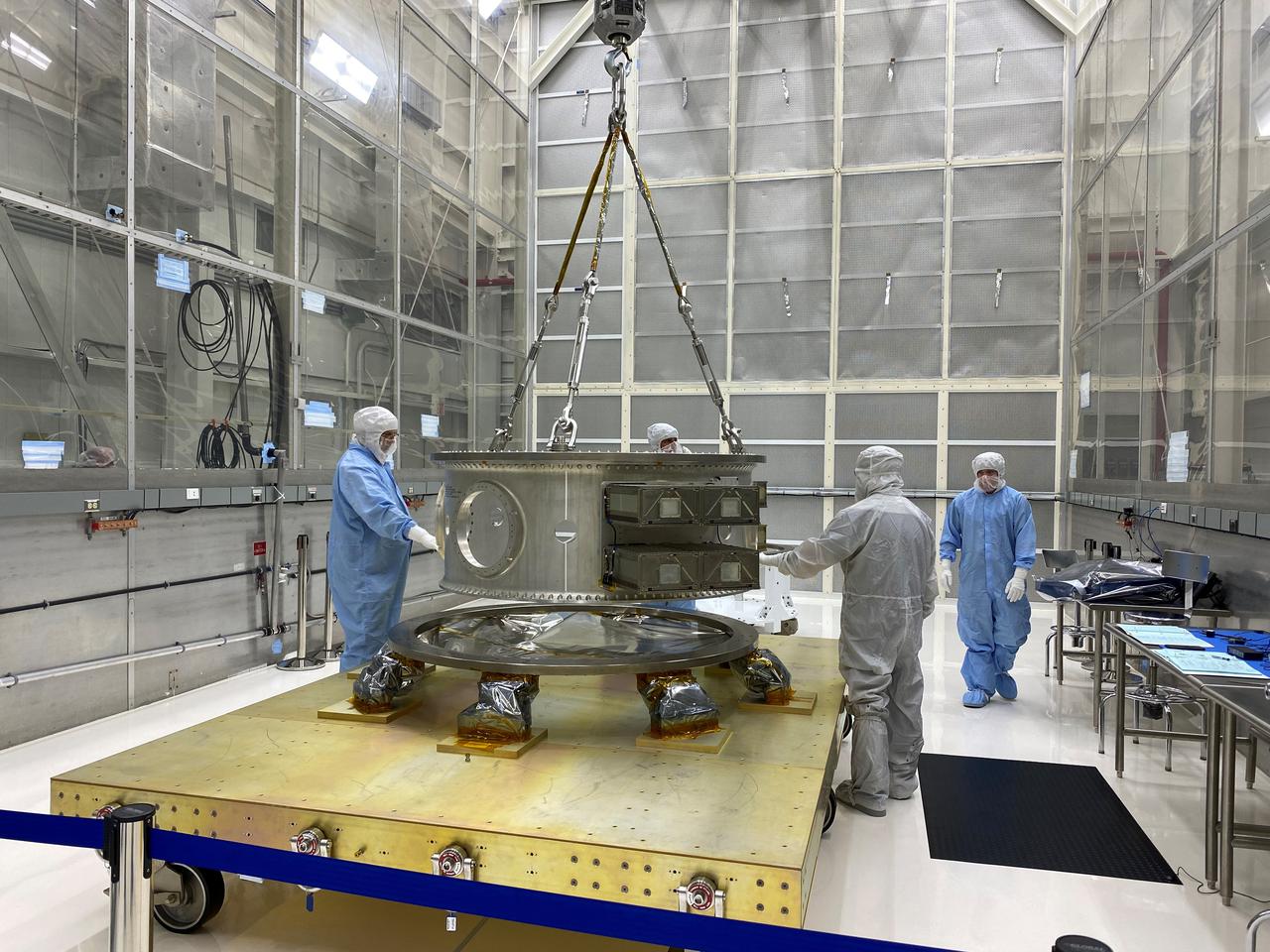 Technicians process mechanical and electrical support equipment for NASA’s Landsat 9 observatory inside the Integrated Processing Facility at Vandenberg Space Force Base in California, on June 16, 2021. The equipment includes a secondary payload adapter and flight system for a group of microsat payloads, called CubeSats, that will launch with Landsat 9 as secondary payloads. Landsat 9 will launch on a United Launch Alliance Atlas V rocket from Space Launch Complex 3 at Vandenberg in September 2021. The launch is being managed by NASA’s Launch Services Program based at Kennedy Space Center, America’s multiuser spaceport. The Landsat 9 satellite will continue the nearly 50-year legacy of previous Landsat missions. It will monitor key natural and economic resources from orbit. Landsat 9 is managed by the agency’s Goddard Space Flight Center in Greenbelt, Maryland. The satellite will carry two instruments: the Operational Land Imager 2, which collects images of Earth’s landscapes in visible, near infrared and shortwave infrared light, and the Thermal Infrared Sensor 2, which measures the temperature of land surfaces. Like its predecessors, Landsat 9 is a joint mission between NASA and the U.S. Geological Survey. 
