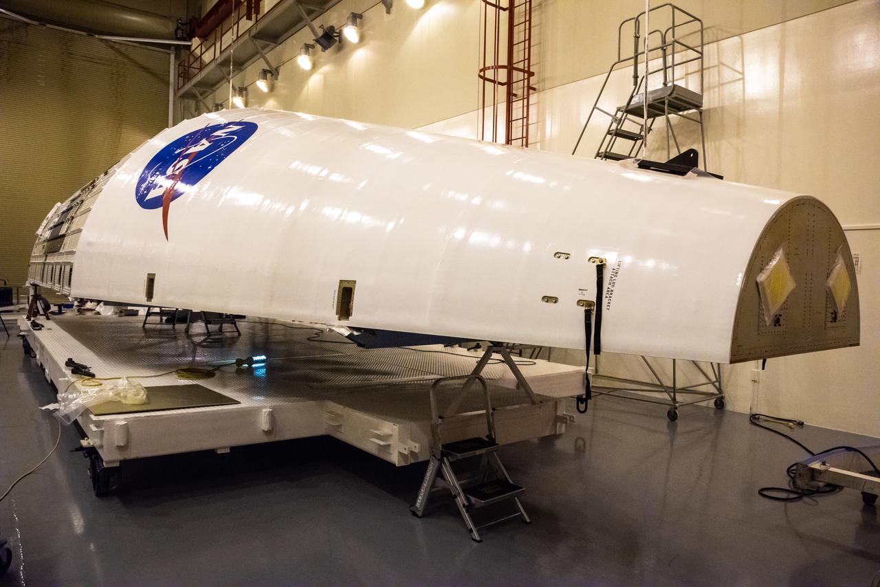 Inside the Integrated Processing Facility at Vandenberg Space Force Base in California, preparations are underway to perform ultraviolet and white light inspections on one of two United Launch Alliance Atlas V rocket payload fairings for NASA’s Landsat 9 satellite on June 17, 2021. The fairings will encapsulate the satellite for its launch atop the Atlas V from Vandenberg in September 2021. The launch is being managed by NASA’s Launch Services Program based at Kennedy Space Center in Florida. Landsat 9 will continue the nearly 50-year legacy of previous Landsat missions. It will monitor key natural and economic resources from orbit. Landsat 9 is managed by the agency’s Goddard Space Flight Center in Greenbelt, Maryland. It will carry two instruments: the Operational Land Imager 2, which collects images of Earth’s landscapes in visible, near-infrared and shortwave infrared light, and the Thermal Infrared Sensor 2, which measures the temperature of land surfaces. Like its predecessors, Landsat 9 is a joint mission between NASA and the U.S. Geological Survey.